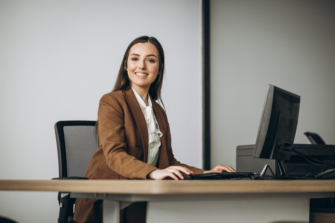 young_business_woman_working_laptop_office_1170x779